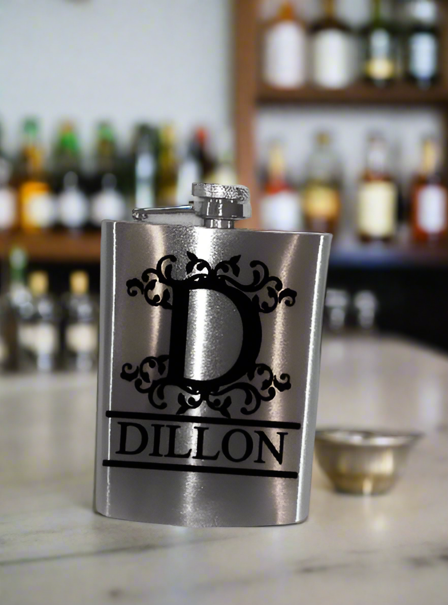 silver stainless steel flask with laser engraved name on the side